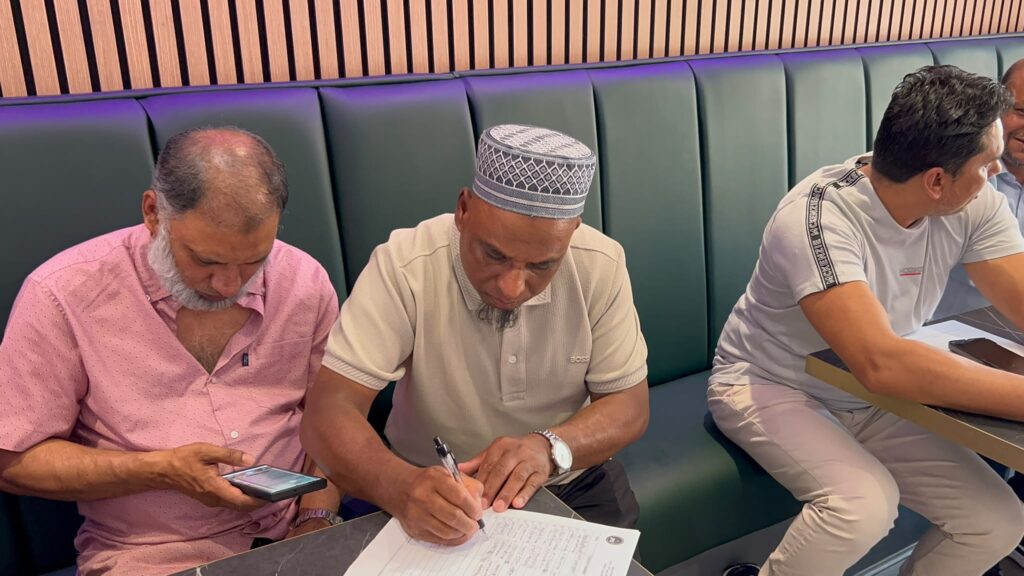 Attendees at the Jagannathpur Probashi Shongo Biennial General Meeting 2026, Uzan Vati Restaurant, Oldham.